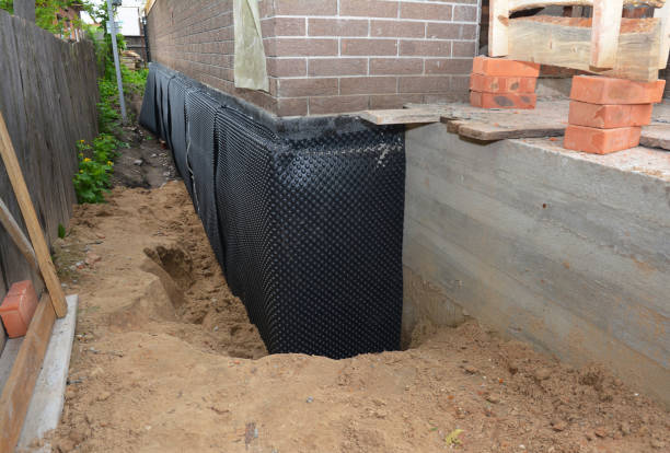 Happy homeowners after waterproofing job in Laingsburg